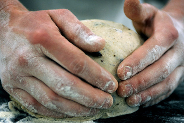 kneading dough with flour