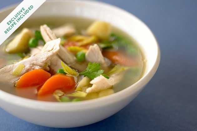 chicken soup with carrot, potato and herbs