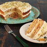 pistachio and white chocolate cake with pistachio crumbs on top