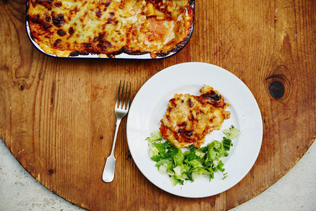 lasagne on a plate with salad