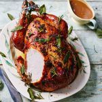 perfect turkey recipes for christmas day with lemon and herbs on top