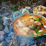 how to make curry sauce - Chicken curry on a outdoor fire