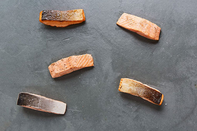 scattered pieces of salmon for salmon recipes