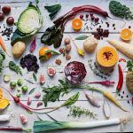 flat lay of vegetables on a white wooden table