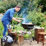 barbecued fish - jamie using BBQ outside cooking
