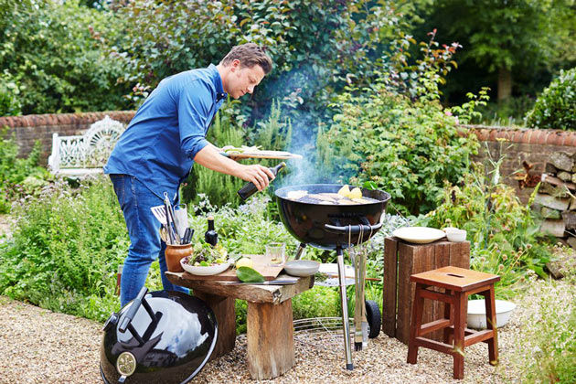 barbecued fish - jamie using BBQ outside cooking