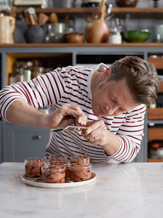 Jamie adds the finishing touches to his chocolate dessert