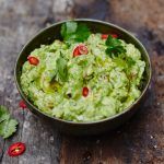 A bowl of guacamole, a great snack for kids