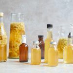 Elderflower vinegar in bottles and jars