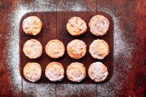 11 mince pies with star pastry topping and icing sugar