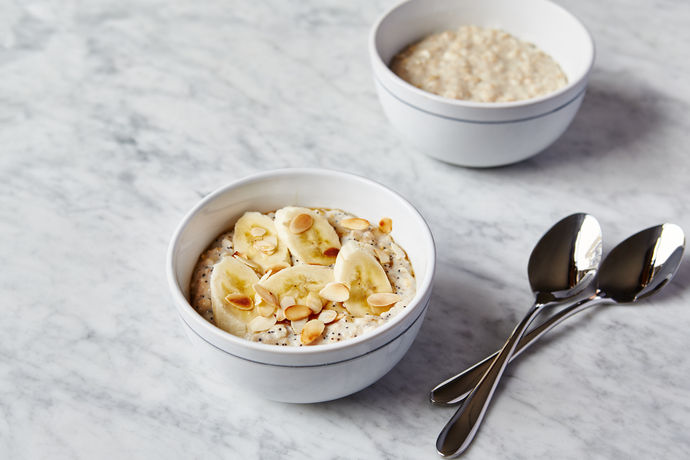 Bowl of porridge with bananas and almonds as a cheap breakfast idea