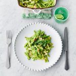 Spring greens recipes - plate of green mac n cheese with knife and fork