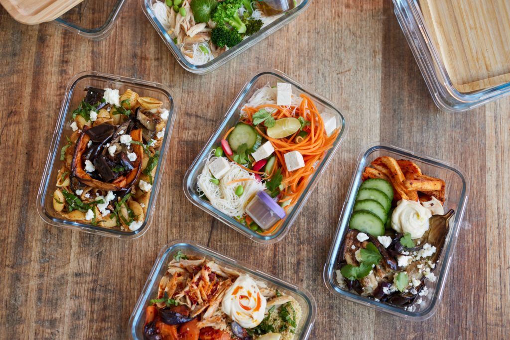 Meal prep recipes for summer - 5 tuppaware dishes filled with vibrant, fresh food