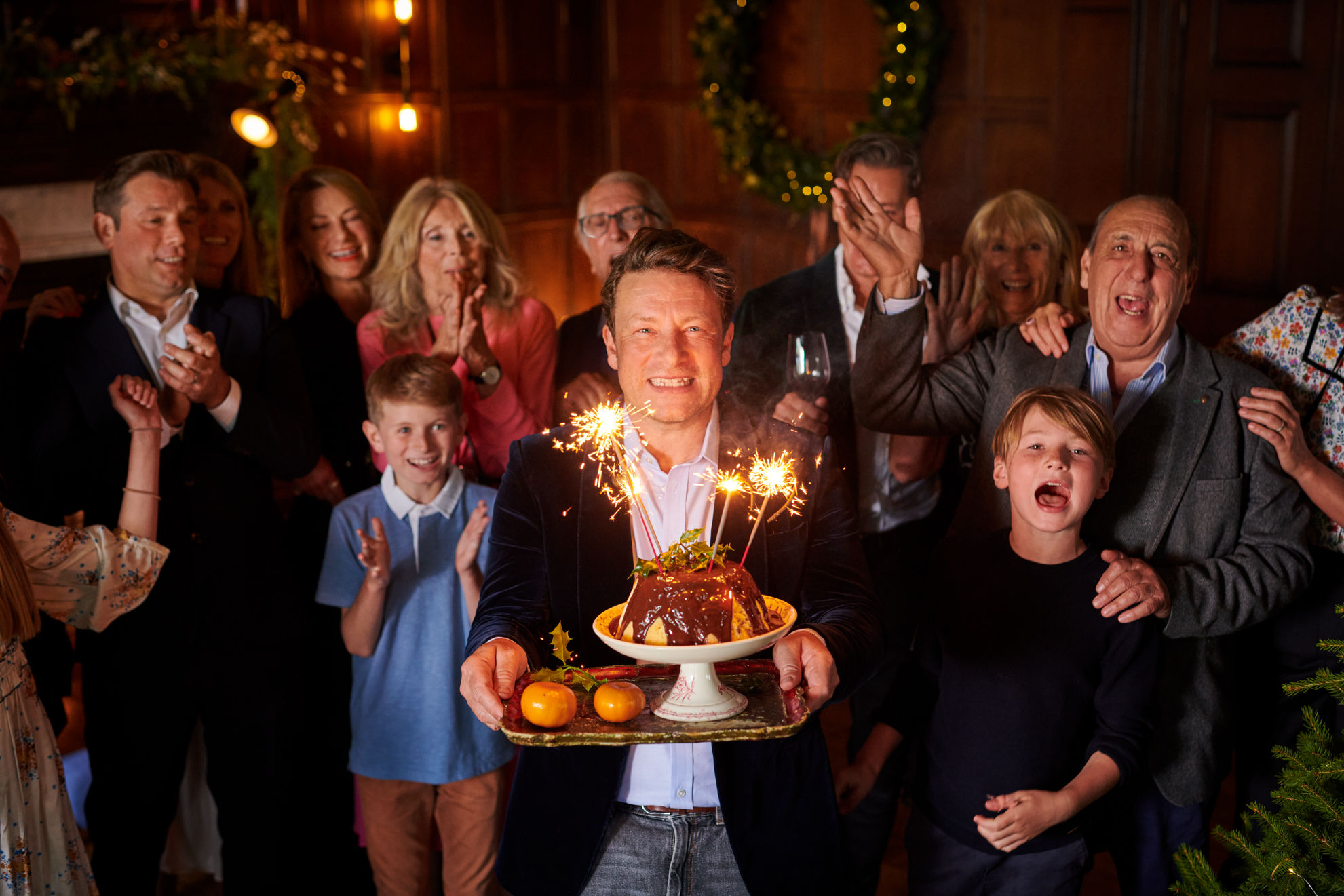 Jamie and family with a Winter bombe dessert, complete with sparklers!