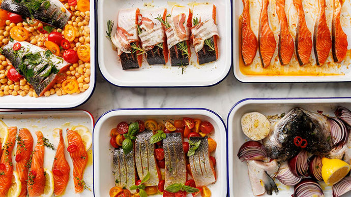 Six different ways to prepare salmon, laid out on trays
