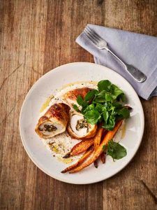 Chicken and mushroom pastry parcels cooked in the air fryer, served with carrots and greens