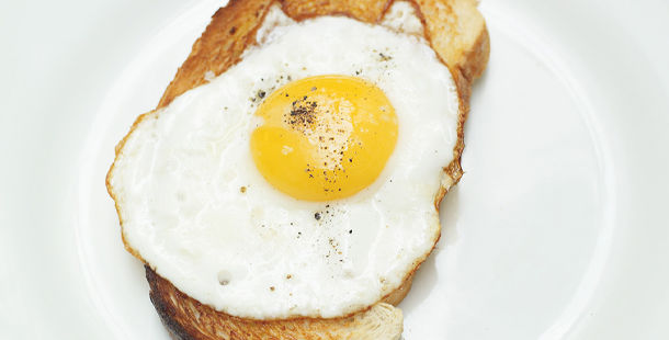 fried egg on toast with pepper