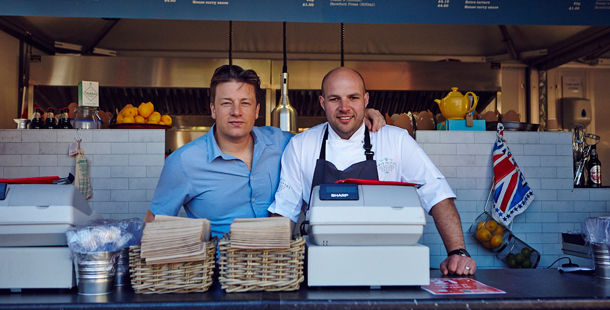 jamie oliver next to a chef in America