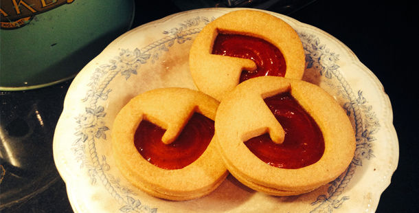 jammie dodger biscuit with the letter 'J' cut out