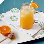 honey drink with clementine fizz and ice