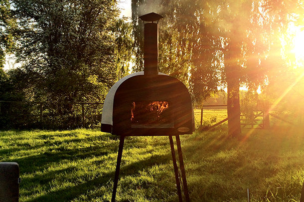 wood-fired oven outdoors in field