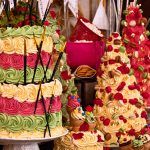 colourful, decorated cakes with tiers and colorful icing