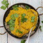 tarka dhal lentils with coriander on top and rice underneath