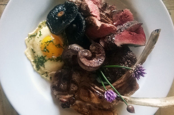pieces of beef, egg, mushrooms with herbs