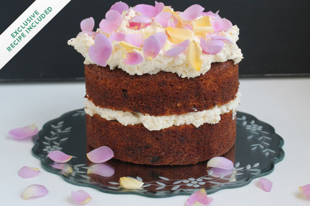 carrot cake recipe with cream cheese on top and edible petals