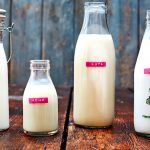 milk bottles with different non-dairy milk alternatives