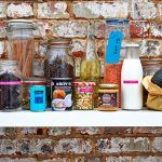 organising your cupboard - labelled jars and food