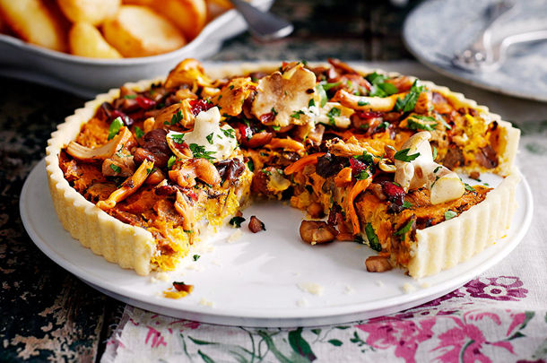 vegetable quiche recipe with mushrooms and vegetables on top