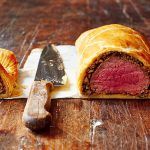 beef cooked rare wrapped in pastry and cut in half