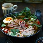 asian inspired ramen broth with egg, meat, veg and noodles