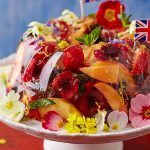 local fruit - a prosecco jelly with british local fruits scattered on top and flowers