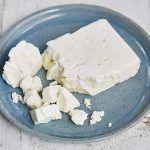 feta cheese in a block, crumbled