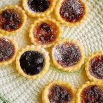 jam tarts with icing sugar dusted on top