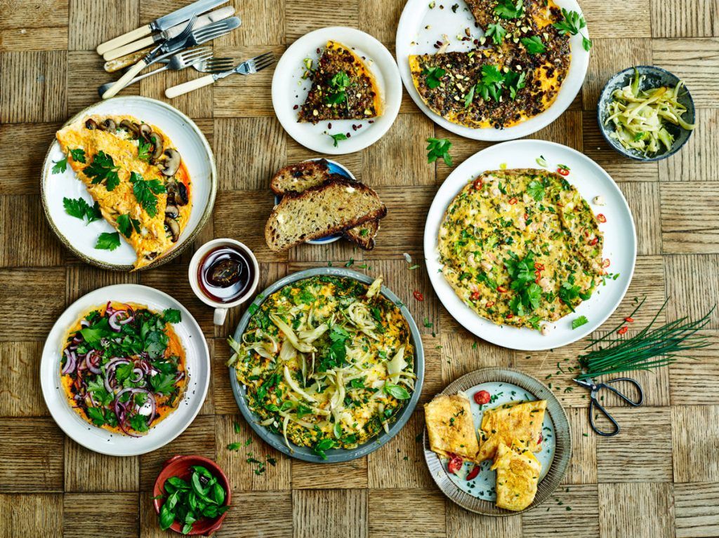 an array of omelette recipes with veg and coriander on top in a flat lay