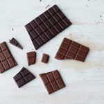 chocolate bars broken into smaller pieces flat lay