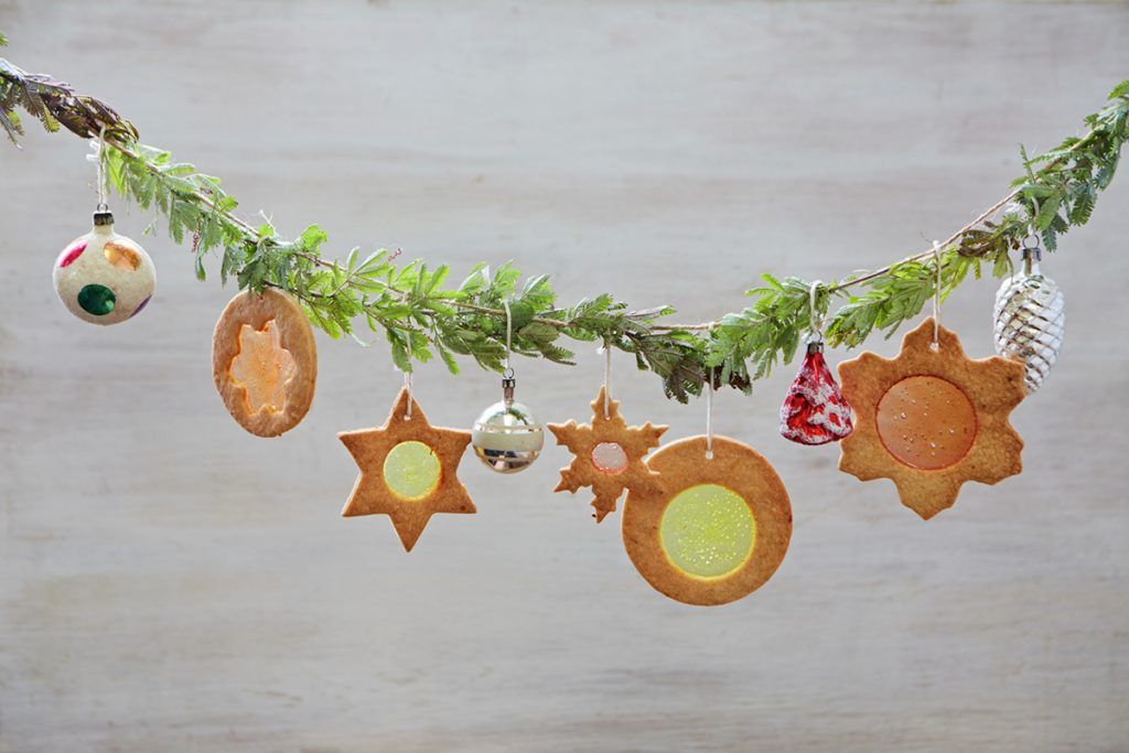 Christmas cookies hanging on a christmas tree branch