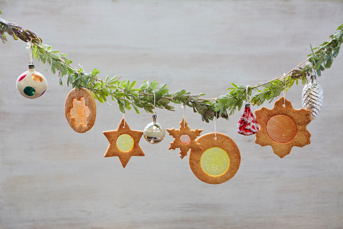 Christmas cookies hanging on a christmas tree branch