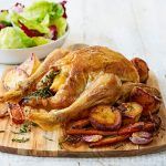 roast chicken with roast potatoes, roast veg and garlic