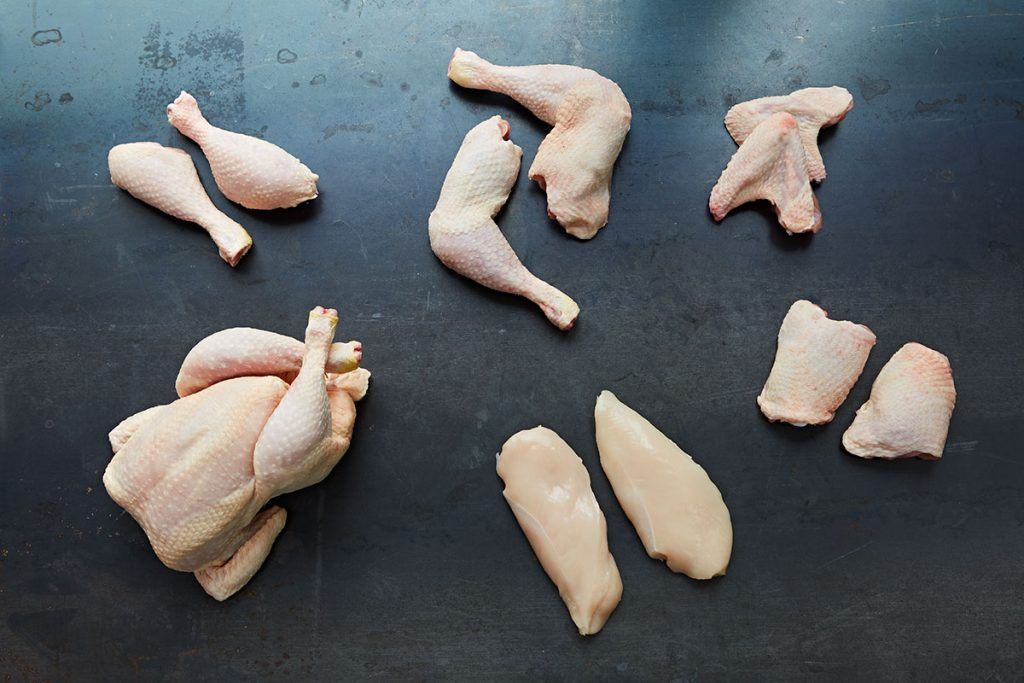 whole chicken sliced up into different parts