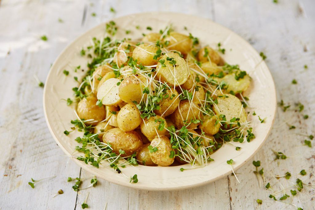 new potato salad with herbs on top
