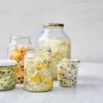 fermenting - vegetables filled into jars