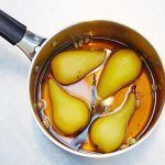 poached pears in a pan - october recipe