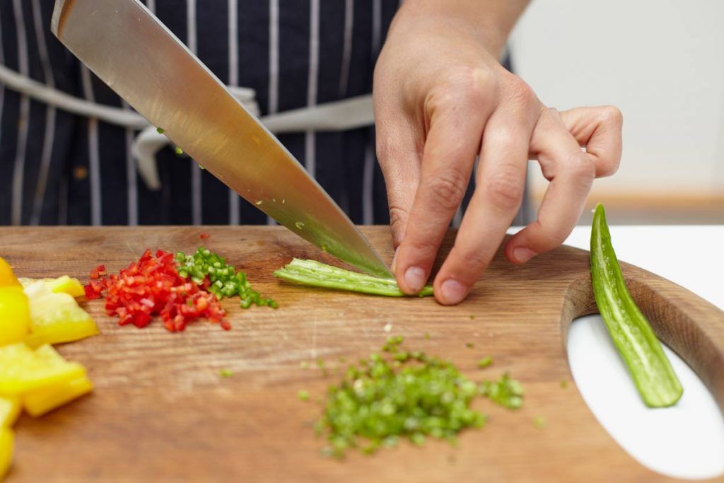 skill school healthy vegetables being sliced on board