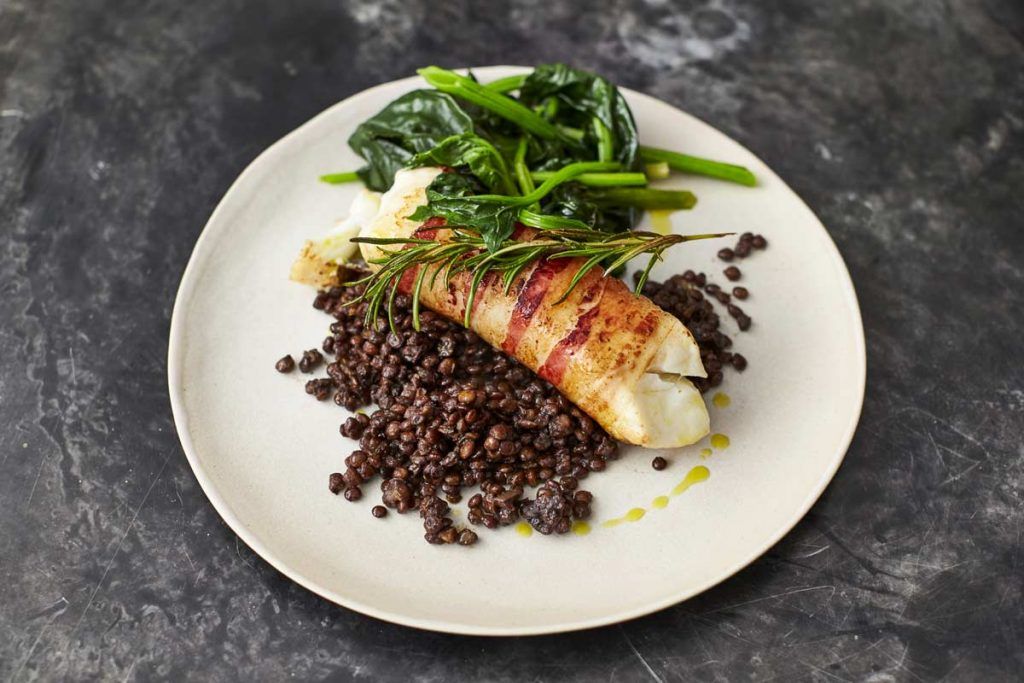 dairy-free pancetta wrapped around cod with lentils