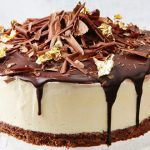 black forest gateaux with chocolate flakes on top and gold leaf scattered