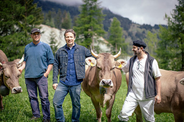 jamie with farmers and the cows